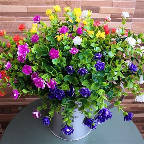 Once the plant is fully dry, you are ready to use the UV-protectant spray. . Plastic flowers for outside